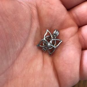 Pearl cage—butterfly